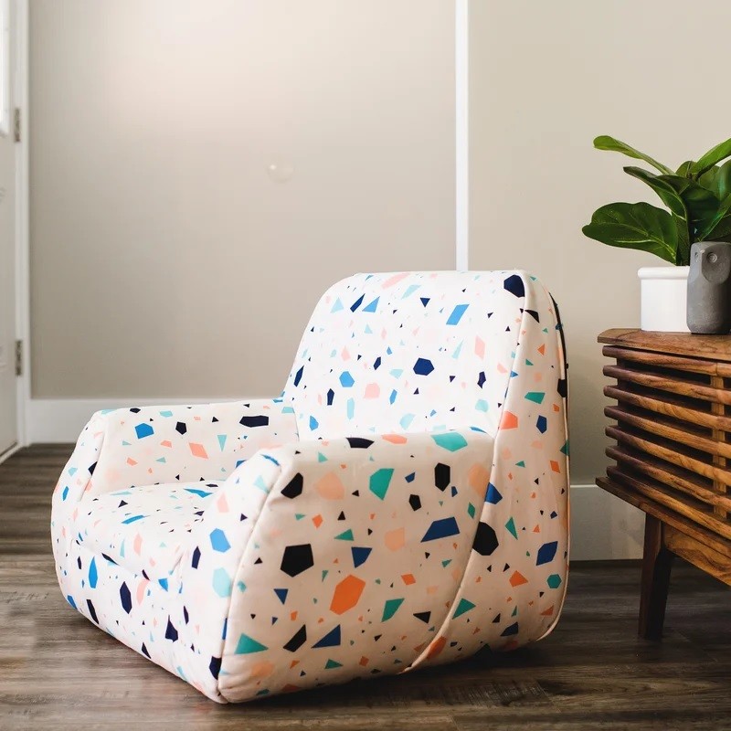 cute kids floor chair with terrazzo print colorful printed seating ideas for kids bedroom nursery floor seating for toddlers reading nook inspiration playful colorful childrens