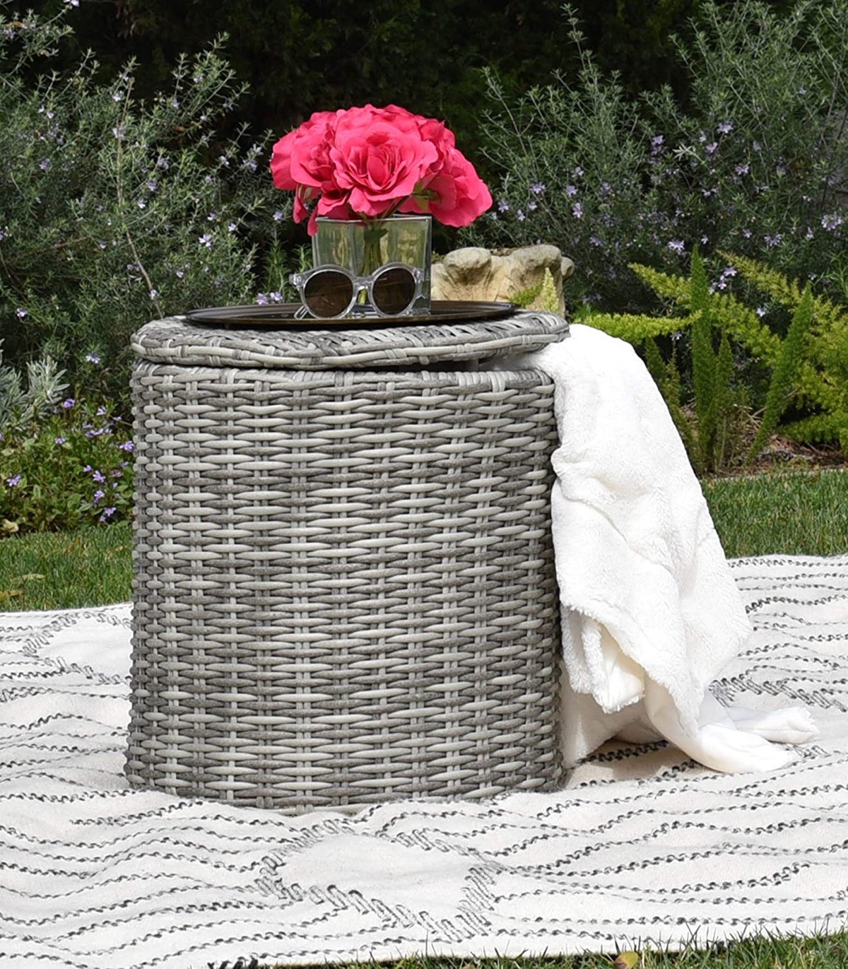 Wicker outdoor side table with hidden storage