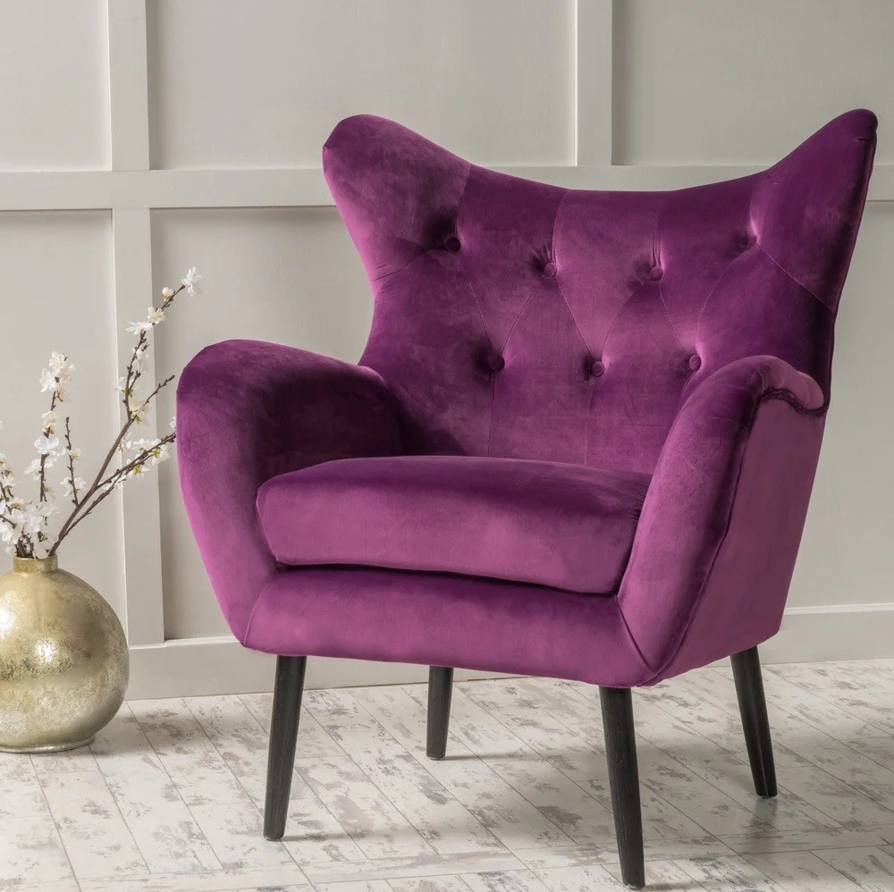 Purple velvet armchair